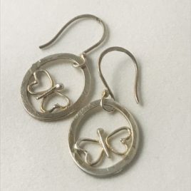 Earring – Sterling silver circle wire with butterfly motif