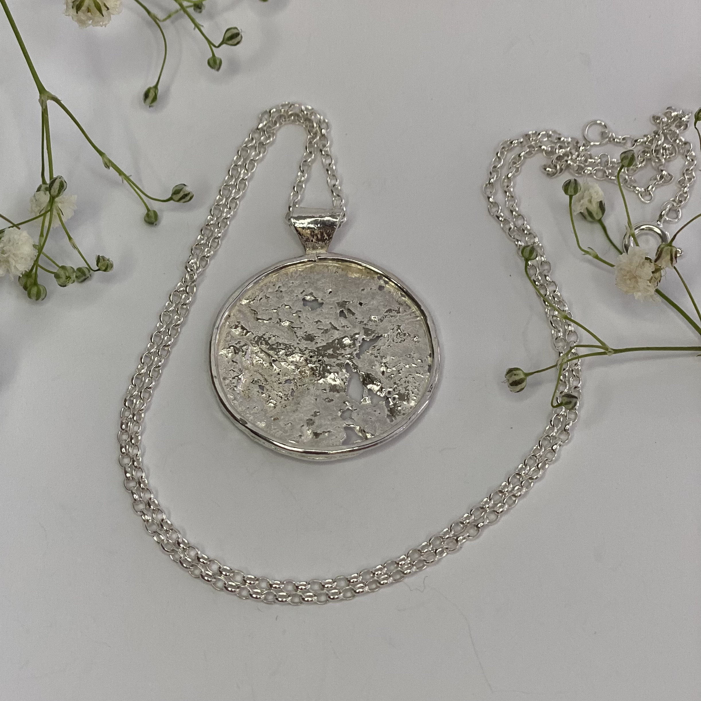 Pendant – Crafted from molten sterling silver